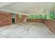 Covered patio with brick columns, offering an outdoor living space at 4807 Kenilworth Dr, Stone Mountain, GA 30083
