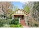 Charming craftsman home with a brick staircase, stone pillars, and lush landscaping in a beautiful, established neighborhood at 171 Westminster Ne Dr, Atlanta, GA 30309