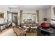Bright living room with large windows, neutral tones, and stylish furnishings creating a welcoming atmosphere at 171 Westminster Ne Dr, Atlanta, GA 30309