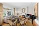 Cozy living room with fireplace, plush seating, and large windows at 171 Westminster Ne Dr, Atlanta, GA 30309