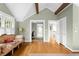 Bright, large main bedroom with hardwood floors and beamed, vaulted ceilings at 171 Westminster Ne Dr, Atlanta, GA 30309
