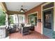 Inviting front porch with stylish seating and mosaic tile flooring at 171 Westminster Ne Dr, Atlanta, GA 30309