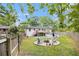 Spacious backyard featuring a fire pit, pool, and deck, perfect for outdoor entertaining and relaxation at 2779 Fairlee Dr, Decatur, GA 30032