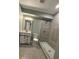 This bathroom features a tiled walk in shower, a tile floor, and neutral paint at 3078 Michael Sw Dr, Marietta, GA 30060