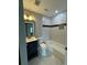 Charming bathroom featuring a vanity sink and a tiled bathtub with a shower at 3078 Michael Sw Dr, Marietta, GA 30060