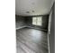 A bedroom with neutral walls, updated flooring, and natural light at 3078 Michael Sw Dr, Marietta, GA 30060