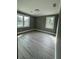 Bright bedroom with hardwood-style floors and neutral paint at 3078 Michael Sw Dr, Marietta, GA 30060