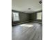 Bright bedroom with hardwood-style floors and neutral paint at 3078 Michael Sw Dr, Marietta, GA 30060