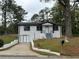 Charming renovated home with painted brick, inviting entryway, and well-maintained front yard at 3078 Michael Sw Dr, Marietta, GA 30060
