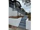A close up of the home's entry and newly painted stairs at 3078 Michael Sw Dr, Marietta, GA 30060