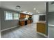 Bright, open kitchen featuring wood cabinets, stainless appliances, and a view to the backyard at 3078 Michael Sw Dr, Marietta, GA 30060