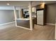 This home features a neutral toned kitchen with a breakfast bar and wood plank flooring at 3078 Michael Sw Dr, Marietta, GA 30060