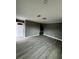 Inviting living area with modern gray flooring, neutral walls, and recessed lighting at 3078 Michael Sw Dr, Marietta, GA 30060