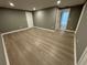 This home features a large, open room with wood plank flooring and recessed lighting at 3078 Michael Sw Dr, Marietta, GA 30060