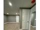 This home features a large, open room with wood plank flooring and recessed lighting at 3078 Michael Sw Dr, Marietta, GA 30060