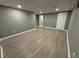 This home features a large, open room with wood plank flooring and recessed lighting at 3078 Michael Sw Dr, Marietta, GA 30060