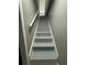 Interior view of staircase with gray steps and white railing at 3078 Michael Sw Dr, Marietta, GA 30060