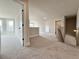 Hallway with carpet, white walls, and open doors at 3154 Rosebud Rd, Loganville, GA 30052