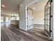 Spacious living room featuring durable floors, modern lighting, and an open layout at 3154 Rosebud Rd, Loganville, GA 30052