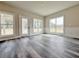 Living room with large windows and door providing ample natural light at 3154 Rosebud Rd, Loganville, GA 30052