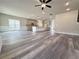 Open floor plan with kitchen and spacious living area with lots of light at 3154 Rosebud Rd, Loganville, GA 30052