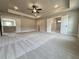 Expansive main bedroom with recessed lighting and multiple entrances at 3154 Rosebud Rd, Loganville, GA 30052