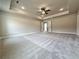 Large main bedroom featuring a ceiling fan and recessed lighting at 3154 Rosebud Rd, Loganville, GA 30052