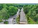 An aerial view of a well-maintained neighborhood, showcasing lush landscaping and ample parking at 5400 Roswell Rd # N1, Sandy Springs, GA 30342