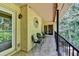 Brick balcony with chairs and leafy view at 5400 Roswell Rd # N1, Sandy Springs, GA 30342