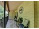 Charming balcony with outdoor seating area and decorative touches at 5400 Roswell Rd # N1, Sandy Springs, GA 30342