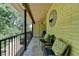 Inviting balcony area with outdoor seating, perfect for relaxation and enjoying the view at 5400 Roswell Rd # N1, Sandy Springs, GA 30342