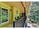 Balcony with seating and view of exterior, close to spiral staircase access at 5400 Roswell Rd # N1, Sandy Springs, GA 30342