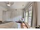 Bedroom featuring hardwood floors, a ceiling fan, a large window, and / closets at 5400 Roswell Rd # N1, Sandy Springs, GA 30342