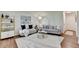 Cozy living room with hardwood floors, a decorative painting, and a floor lamp at 5400 Roswell Rd # N1, Sandy Springs, GA 30342