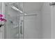 Shower features white subway tiles, glass enclosure, and recessed shelf at 5400 Roswell Rd # N1, Sandy Springs, GA 30342