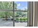 Window overlooking green, landscaped neighborhood at 5400 Roswell Rd # N1, Sandy Springs, GA 30342