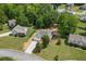 Aerial view of the home, highlighting its location and surrounding neighborhood with mature trees at 102 Pine Bark Dr, Villa Rica, GA 30180