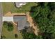 Bird's-eye view capturing the roofline of the house and its well-maintained lawn and landscaping at 102 Pine Bark Dr, Villa Rica, GA 30180