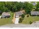 Another aerial view showing the home's placement within its landscaped lot and quiet cul-de-sac at 102 Pine Bark Dr, Villa Rica, GA 30180