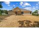 A view of the home's backyard and back porch at 102 Pine Bark Dr, Villa Rica, GA 30180