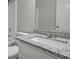 Updated bathroom vanity featuring a granite countertop and modern fixtures at 102 Pine Bark Dr, Villa Rica, GA 30180