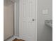 This bathroom features a shower and a door for privacy at 102 Pine Bark Dr, Villa Rica, GA 30180
