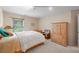 Relaxing bedroom featuring a large wardrobe, twin bed and a peaceful ambiance at 230 Ridge Point Ct, Alpharetta, GA 30022