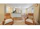 Open living space featuring a casual dining area and a cozy living room space at 230 Ridge Point Ct, Alpharetta, GA 30022