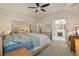 Comfortable primary bedroom featuring neutral tones and connecting bathroom at 230 Ridge Point Ct, Alpharetta, GA 30022