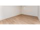 Unfinished basement featuring light wood floors, neutral walls, and white trim at 253 Rockyford Ne Rd, Atlanta, GA 30317