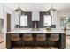 Spacious kitchen with central island, pendant lighting, and modern finishes at 253 Rockyford Ne Rd, Atlanta, GA 30317