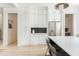 Bright kitchen featuring stainless steel appliances, a large island, and ample white cabinetry at 253 Rockyford Ne Rd, Atlanta, GA 30317