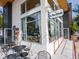 Exterior view of Le Petit Marche market with outdoor seating at 253 Rockyford Ne Rd, Atlanta, GA 30317