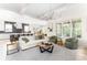 Bright living room featuring modern decor, and open layout to the kitchen at 253 Rockyford Ne Rd, Atlanta, GA 30317